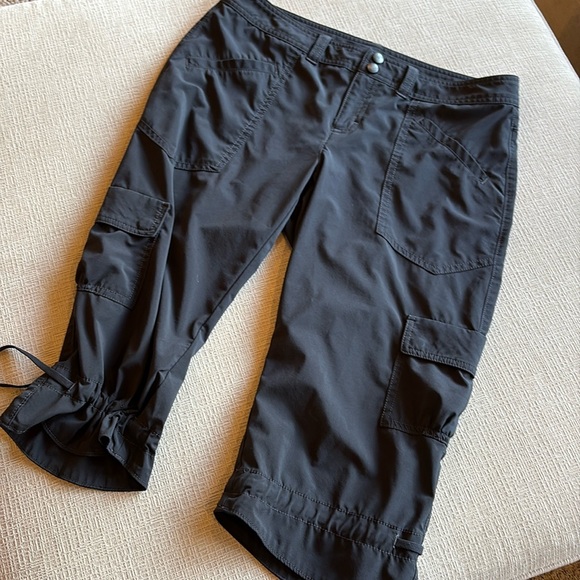 Athleta black capris. Sz 8. Cargo pockets with adjustable leg openings. - Picture 1 of 7
